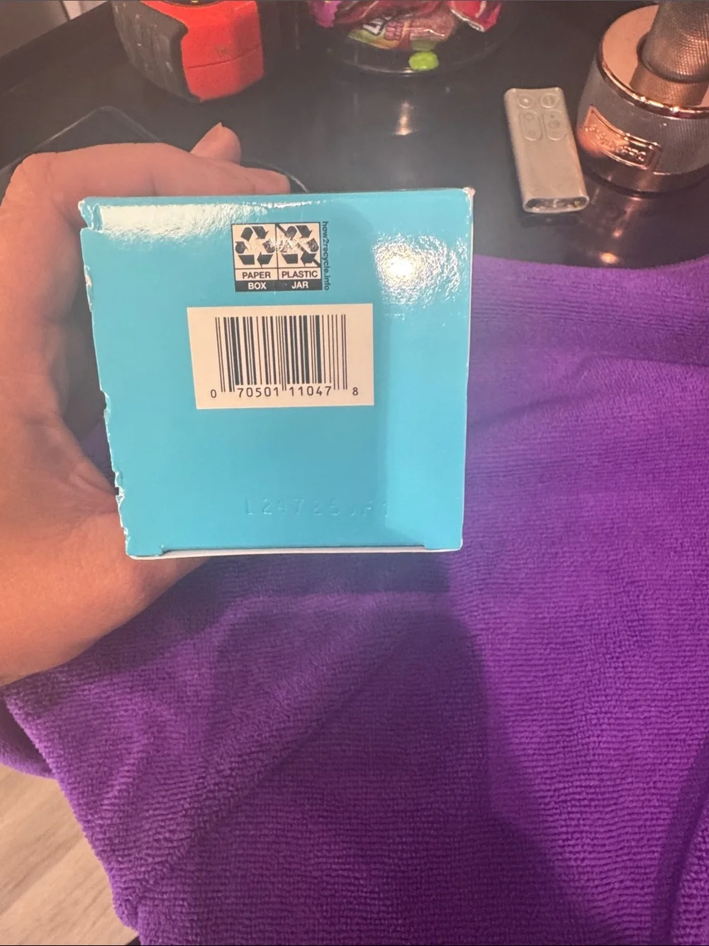 Neutrogena Hydro Boost Water Gel in blue packaging with purple backdrop